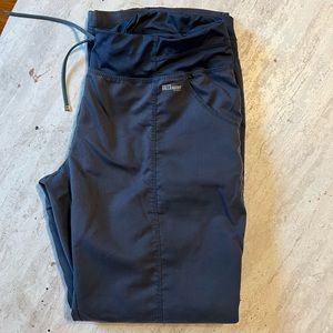 Greys anatomy scrubs. Size large. Some wear on the bottom.